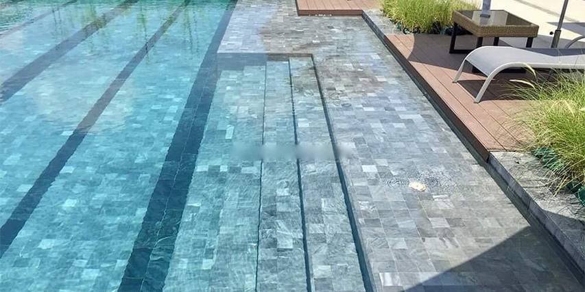 Natural stone pool tiles